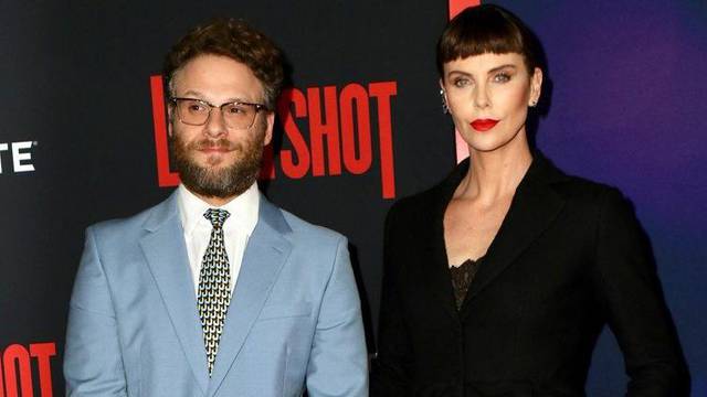 Seth Rogen and Charlize Theron at the Long Shot Premiere