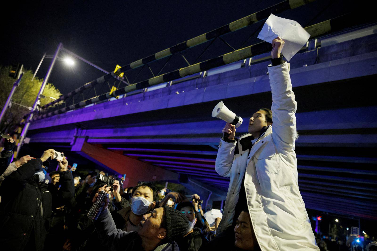 FILE PHOTO: 'Don't yell that': fears compete with calls for 'freedom' at China protests