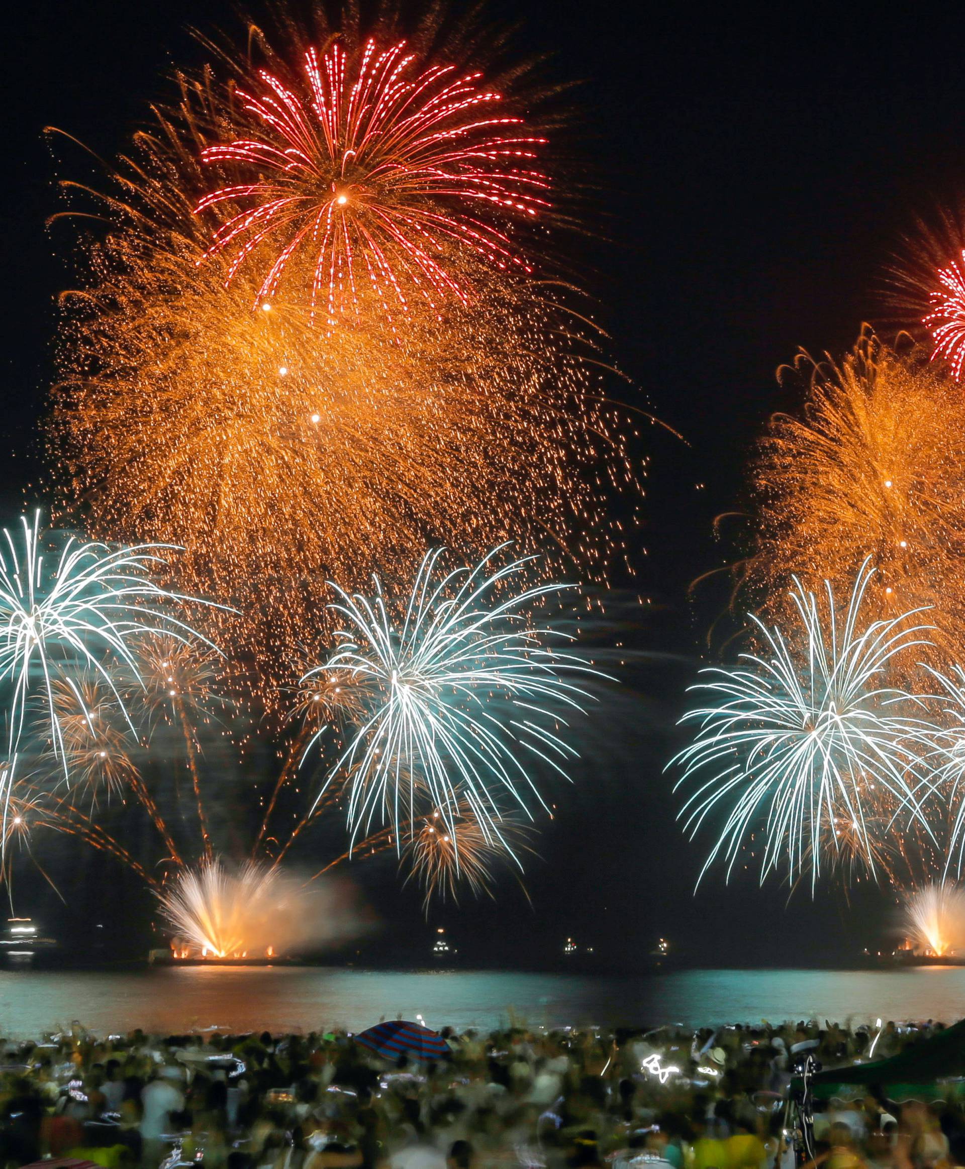 Fireworks explode over Copacabana beach during New Year celebrations in Rio de Janeiro