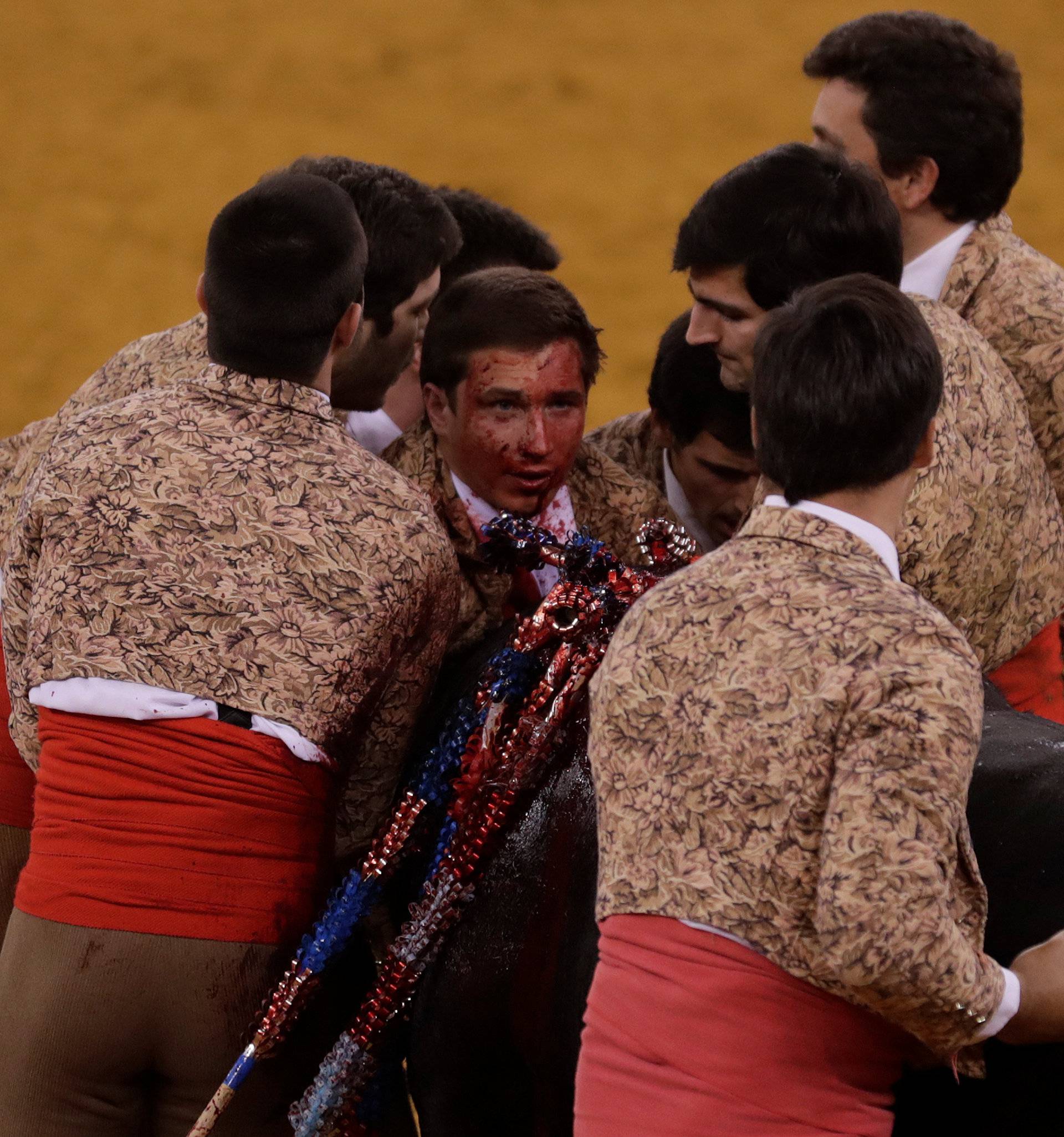 Members of Santarem forcados group perform during a bullfight at Campo Pequeno bullring in Lisbon