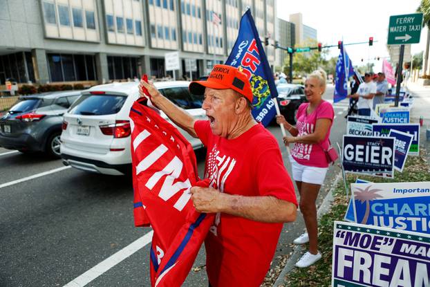 Trump supporters rally during early voting