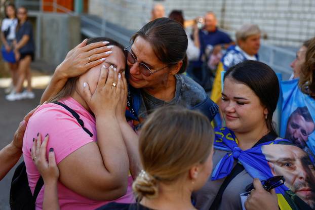 Freed Ukrainian POW returns after a swap in an undisclosed location in Ukraine