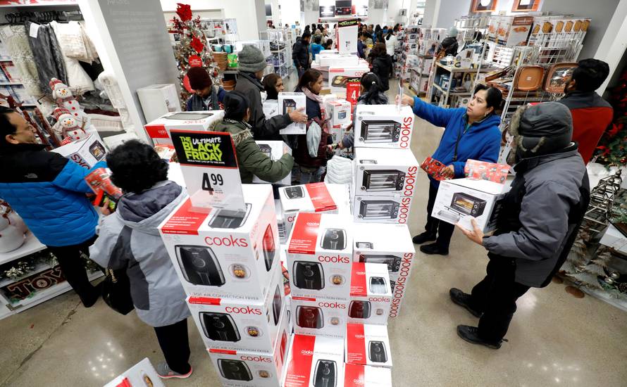 Customers shop for small appliances during the Black Friday sales event on Thanksgiving Day at JCPenney in Niles
