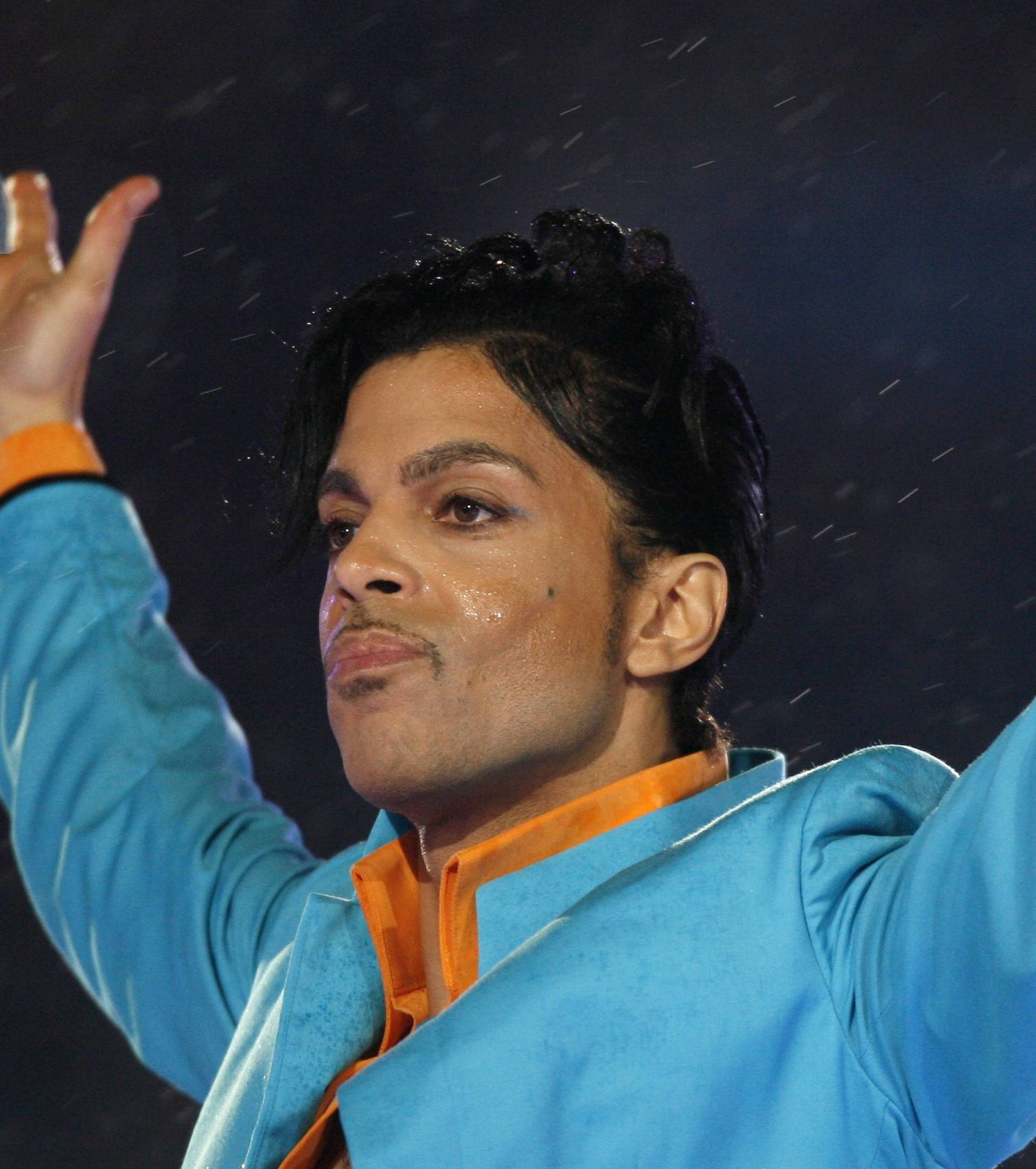 Prince performs during halftime show of the NFL's Super Bowl XLI football game between the Colts and the Bears in Miami