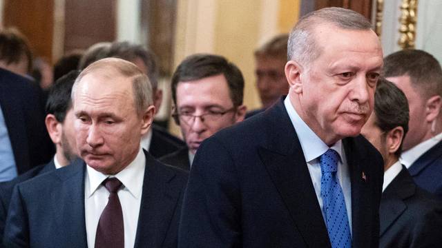FILE PHOTO: Russian President Putin meets with Turkish President Erdogan in Moscow