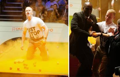 Ekološki aktivist prekinuo SP u snookeru: Skočio na stol i zasuo ga narančastom bojom. A i sebe