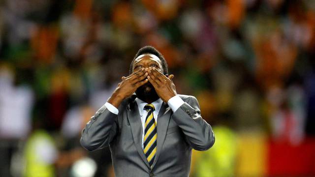 FILE PHOTO: Brazil's soccer legend Pele acknowledges the crowd before the 2012 African Cup of Nations semi-final soccer match between Ivory Coast and Mali in Libreville