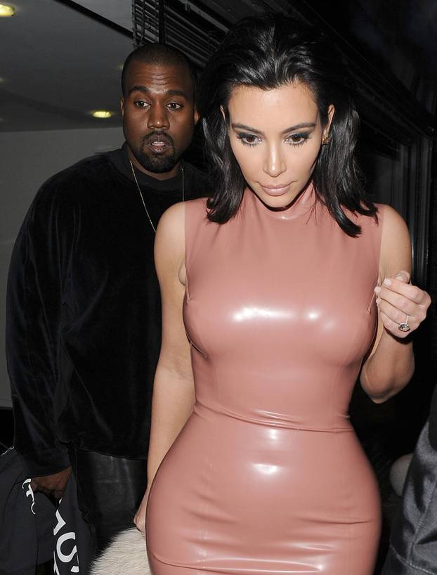 Kim Kardashian and husband Kanye West pay a late night visit to the Sang Bleu tattoo studio in Dalston, Hackney.