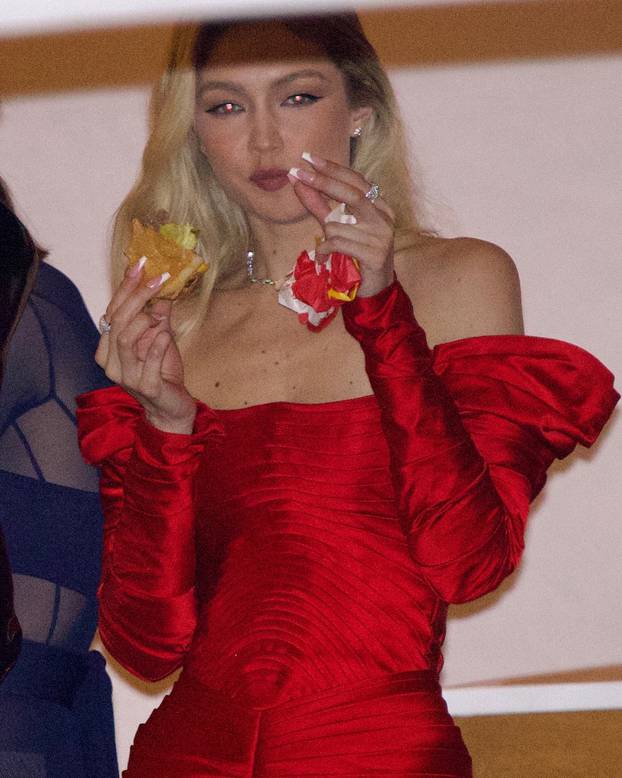 Gigi Hadid enjoys an In-N-Out burger while leaving the Vanity Fair after party!