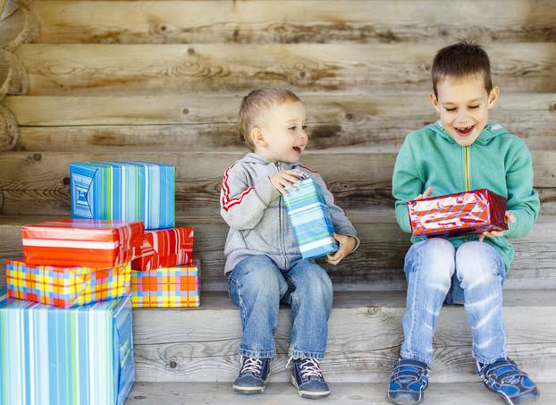 Children,Enjoy,Gifts.,Two,Cute,Brothers,Are,Happy,With,Gifts