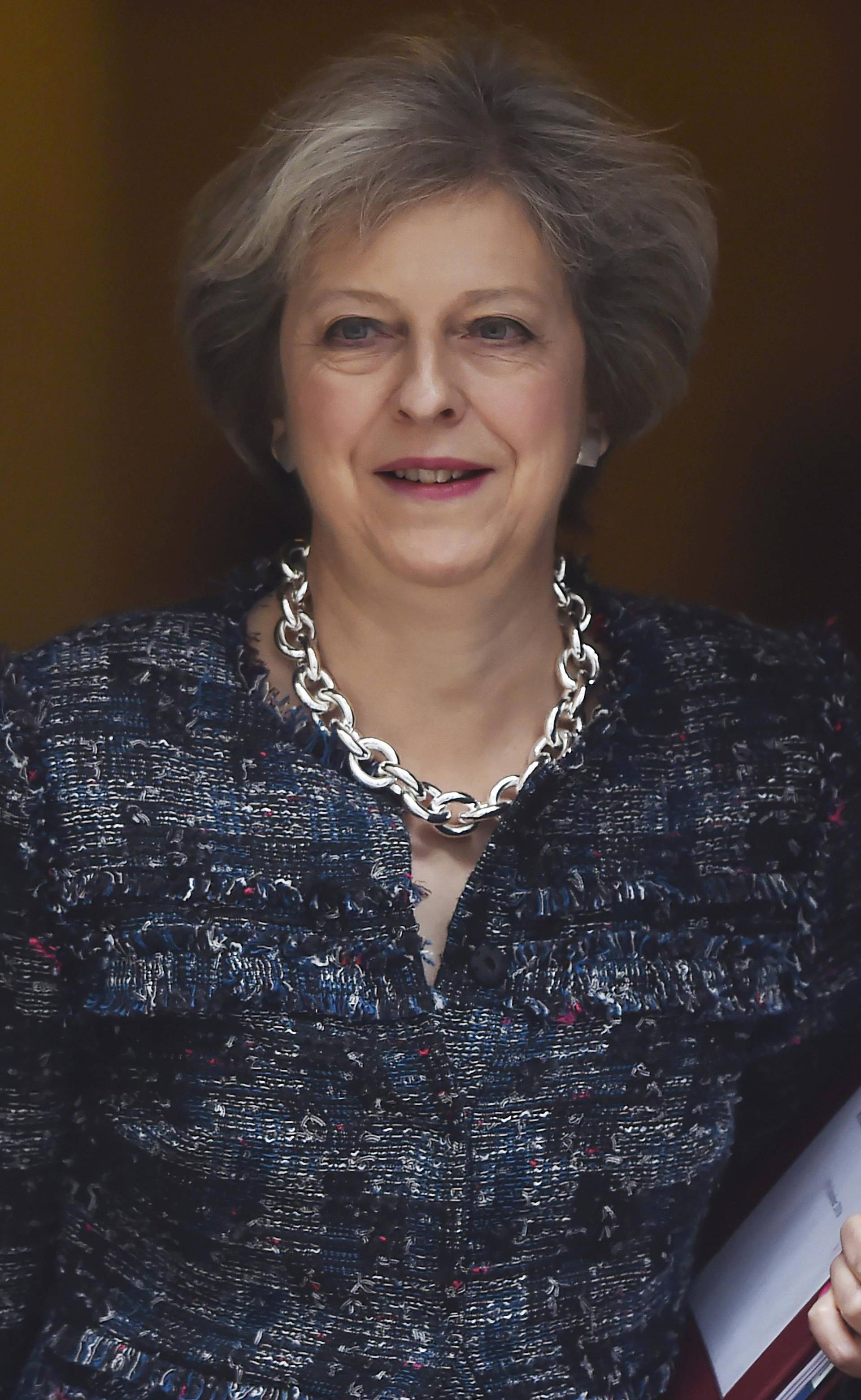 Britain's Prime Minister Theresa May leaves Number 10 Downing Street to attend Prime Minister's Questions at parliament in London