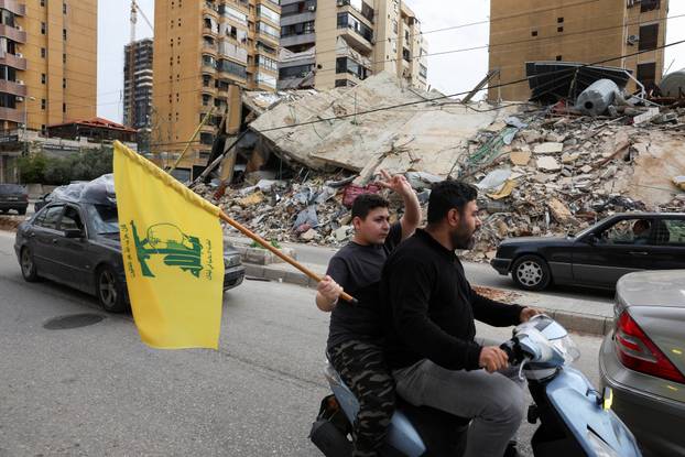 Displaced people return to their homes after a 10-day ceasefire between Lebanon and Israel went into effect, at the southern suburbs of Beirut