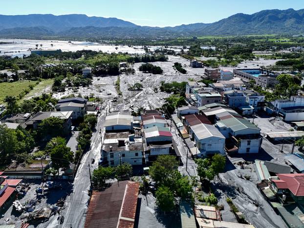 A drone view shows mud covering areas of Hualien