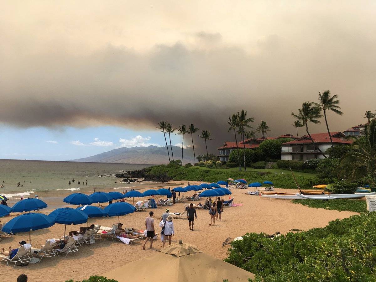 Smoke blankets the sky as a wildfire spreads in Maui