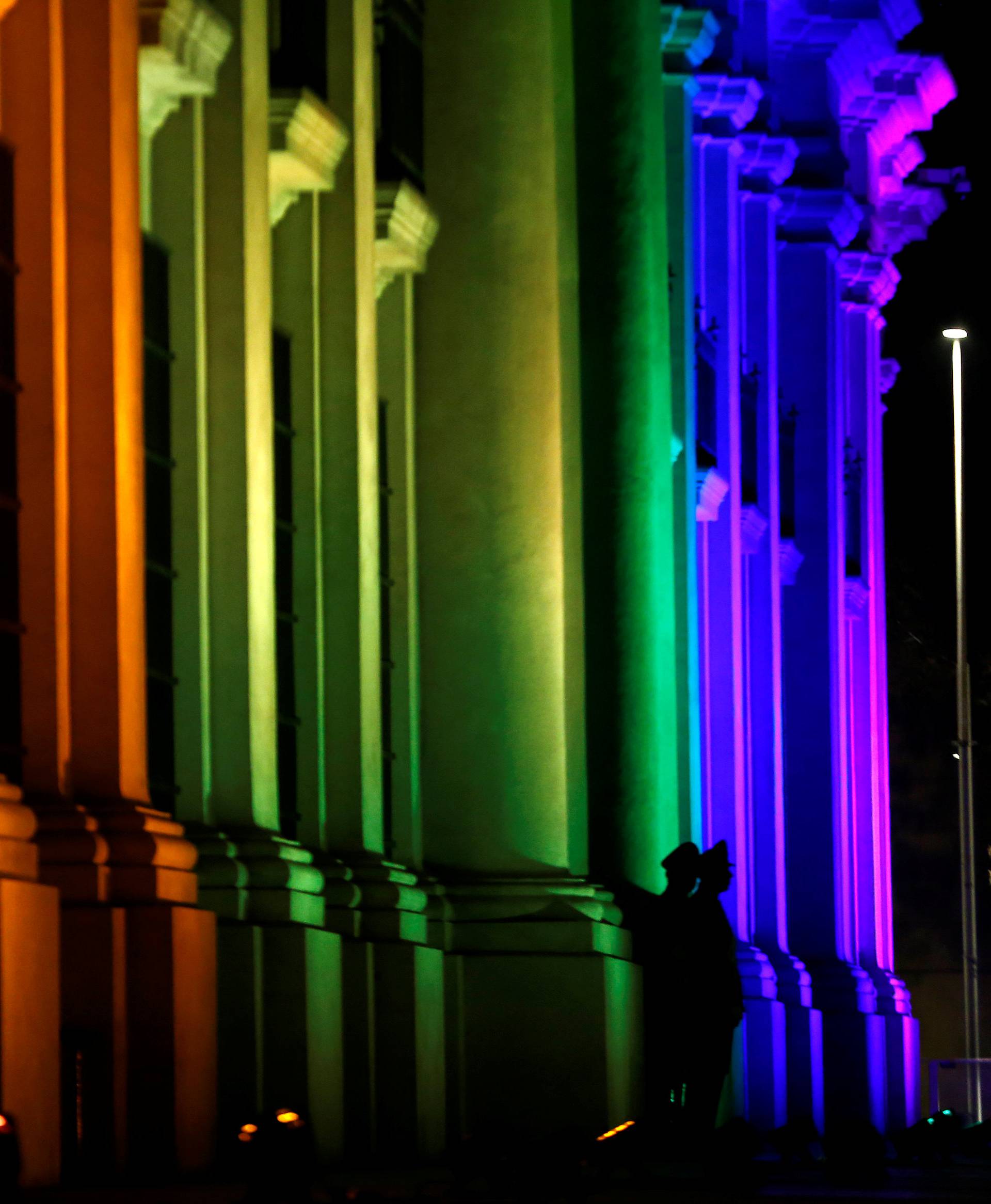 Chile's government house is illuminated with rainbow colours to mark International Day Against Homophobia in Santiago