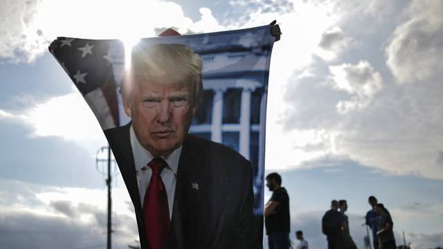 Supporters of Republican presidential candidate and former U.S. President Donald Trump wait for his arrival in Milwaukee