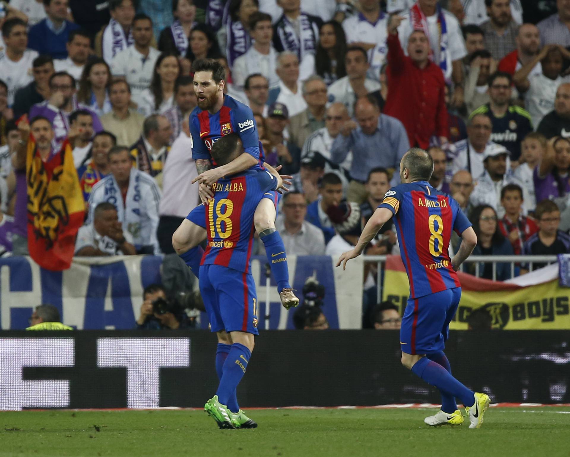 Barcelona's Lionel Messi celebrates scoring their first goal with team mates