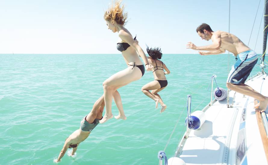 diving in the water during a boat excursion