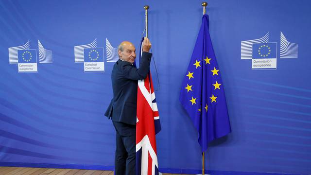 Flags are arranged at the EU headquarters as Britain and EU launch Brexit talks in Brussels