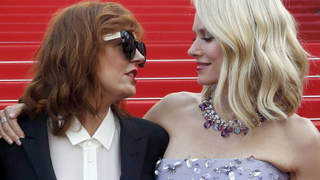 Actresses Susan Sarandon and Naomi Watts pose on the red carpet as they arrive for the opening ceremony and the screening of the film "Cafe Society" out of competition during the 69th Cannes Film Festival in Cannes