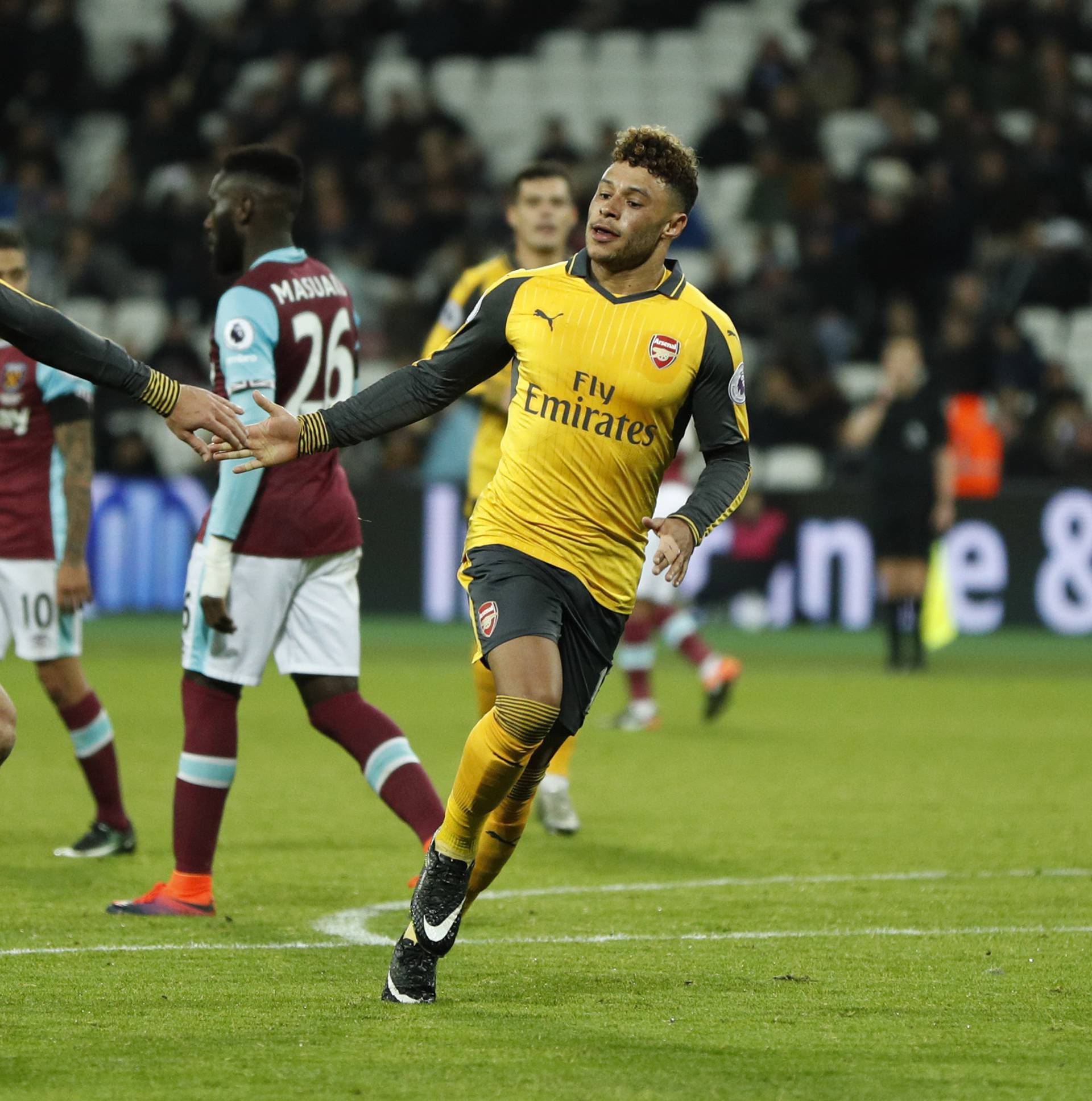 Arsenal's Alex Oxlade-Chamberlain celebrates scoring their fourth goal