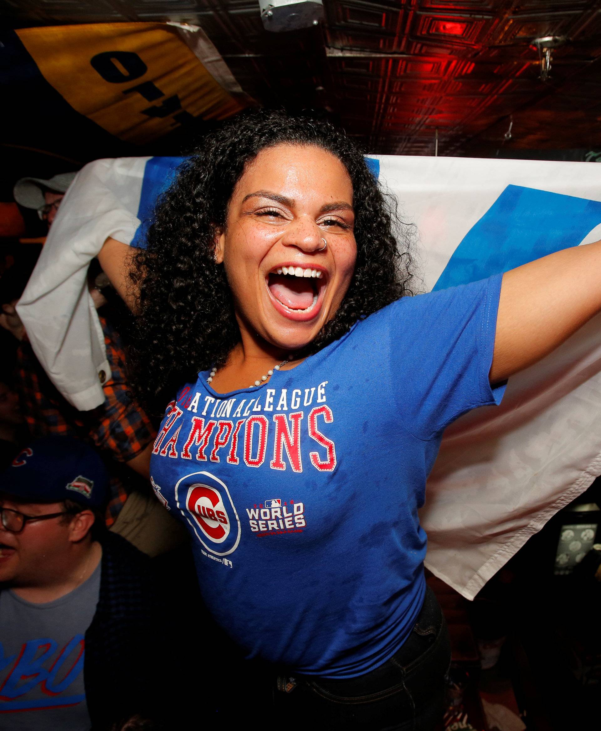 Fans of National League baseball team Chicago Cubs gathered to watch the game at Kelly's bar celebrate their Major League Baseball World Series game 7 victory against American League's Cleveland Indians in Manhattan, New York U.S.