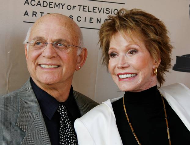 File Photo: Actress Mary Tyler Moore and actor Gavin MacLeod arrive to honor Betty White in Los Angeles