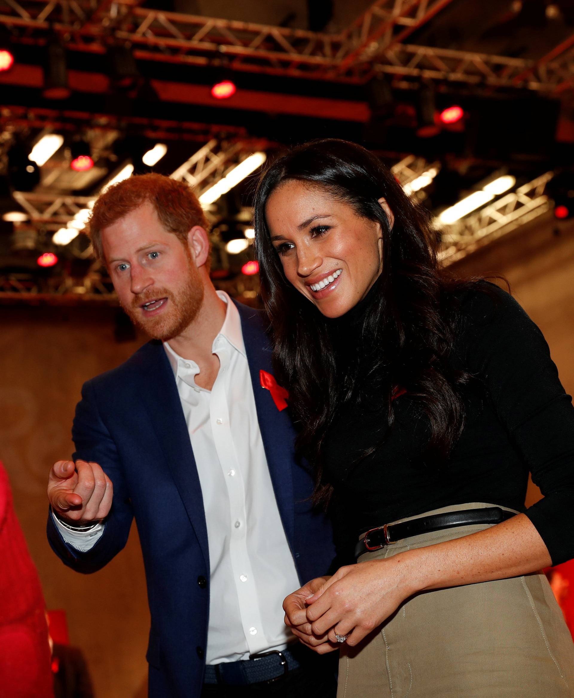 Britain's Prince Harry and his fiancee Meghan Markle visit the Terrence Higgins Trust World AIDS Day charity fair at Nottingham Contemporary in Nottingham