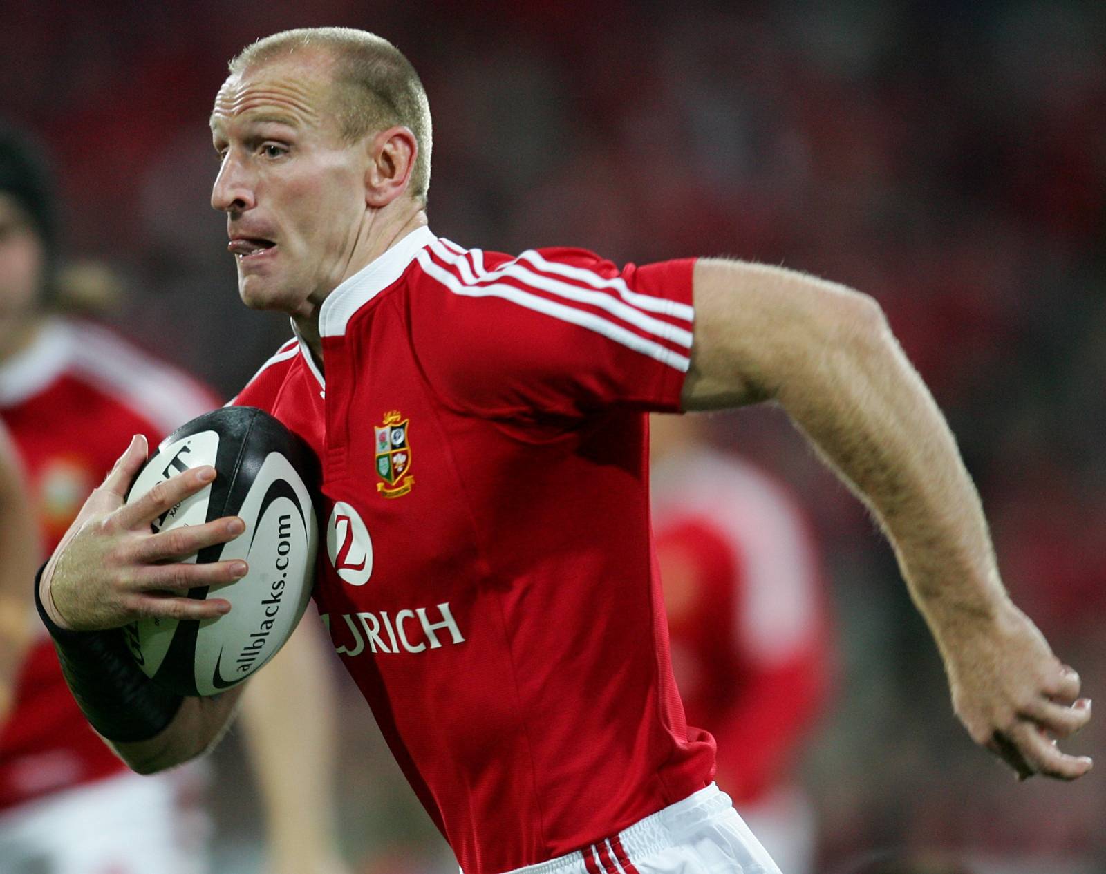 FILE PHOTO:Captain of the British and Irish Lions Thomas runs to score a try against the All Blacks during the second test in Wellington