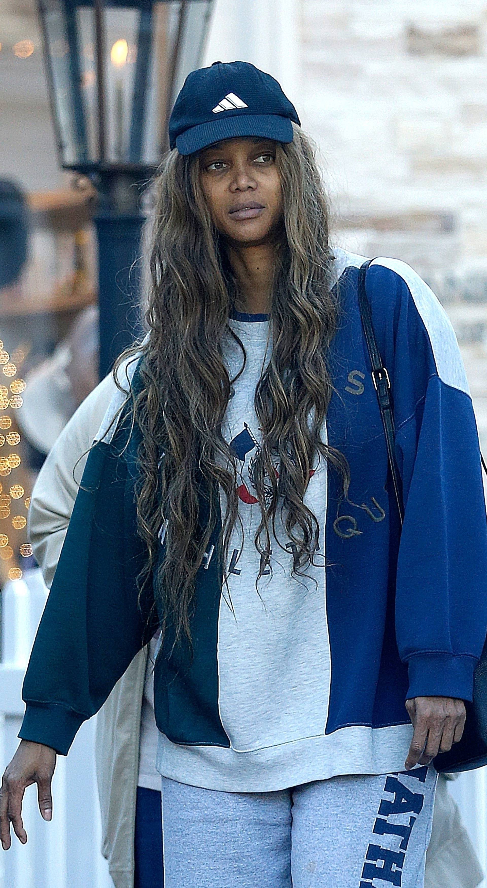 *EXCLUSIVE* Tyra Banks looks the opposite of her "Life-Size 2" character as she steps out with no makeup