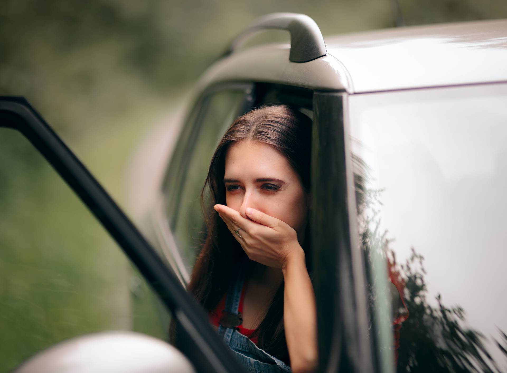 Car Sick Travel Woman with Motion Sickness Symptoms