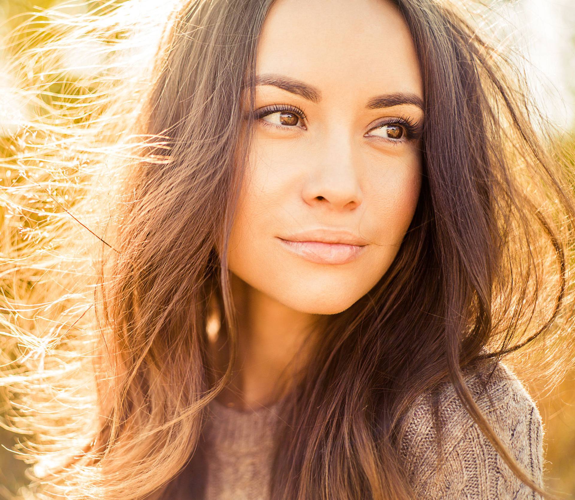 Beautiful lady in autumn landscape