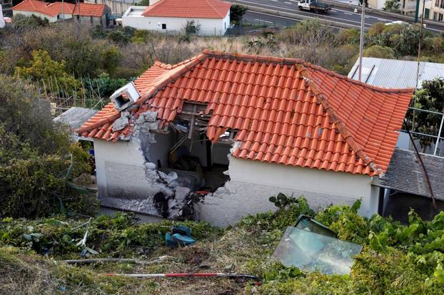 The site of a bus accident is seen in Canico