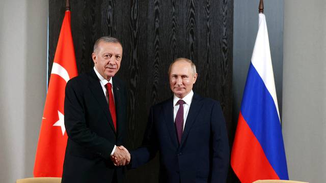 FILE PHOTO: Russian President Putin and Turkish President Erdogan meet in Samarkand