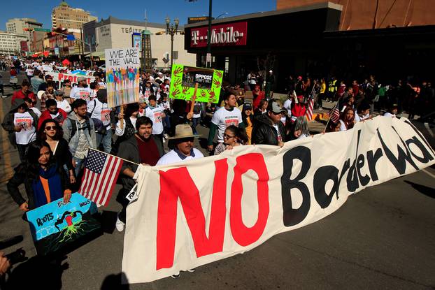 FILE PHOTO: Members of Border Network for Human Rights hold a march to protest against U.S. President Donald Trump