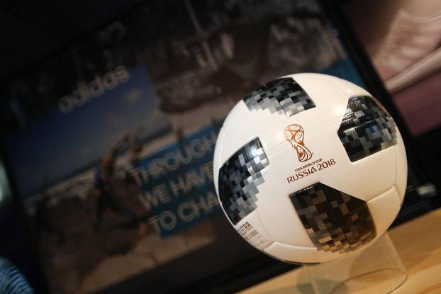 A soccer ball with the sign of the FIFA World Cup 2018 is seen before the Adidas annual news conference in Herzogenaurach