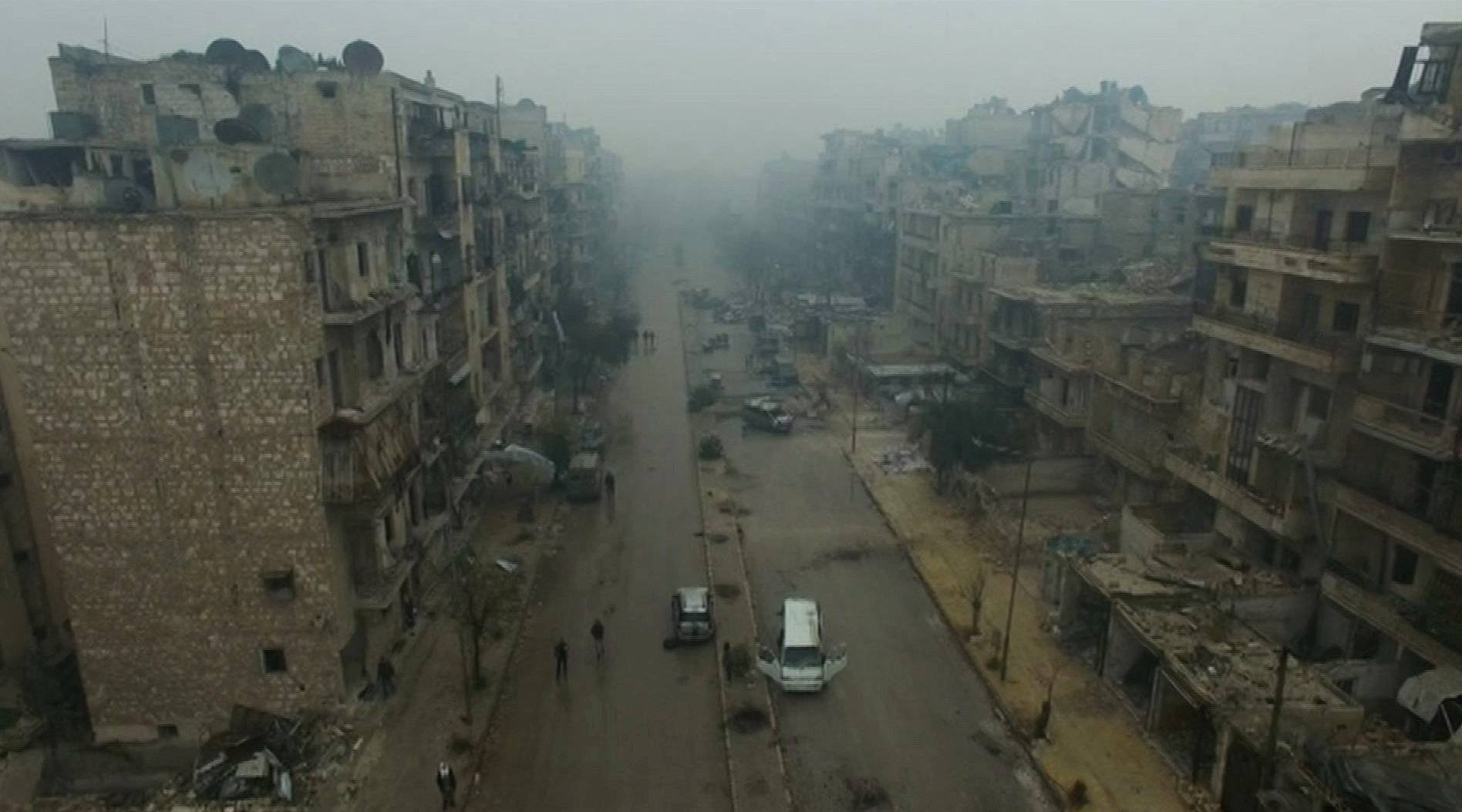 A still image from video of a general view of bomb damaged eastern Aleppo, Syria in the rain