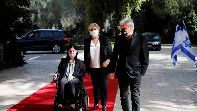 FILE PHOTO: Karine Elharrar, Orna Barbivai and Meir Cohen from the Yesh Atid party arrive for consultations on the formation of a coalition government,
