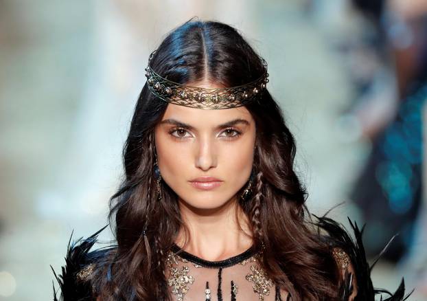 Model Blanca Padilla presents a creation by Lebanese designer Elie Saab as part of his Haute Couture Fall/Winter 2017/2018 collection show in Paris