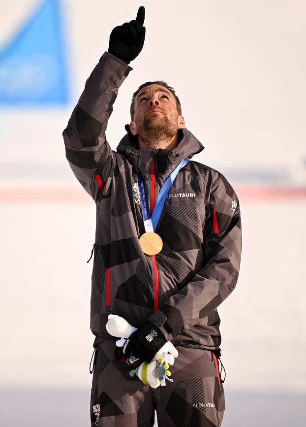 Snowboard - Men's Parallel Giant Slalom Victory Ceremony