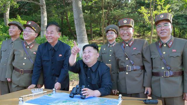 North Korean leader Kim Jong Un inspects the intermediate-range ballistic missile Pukguksong-2's launch test