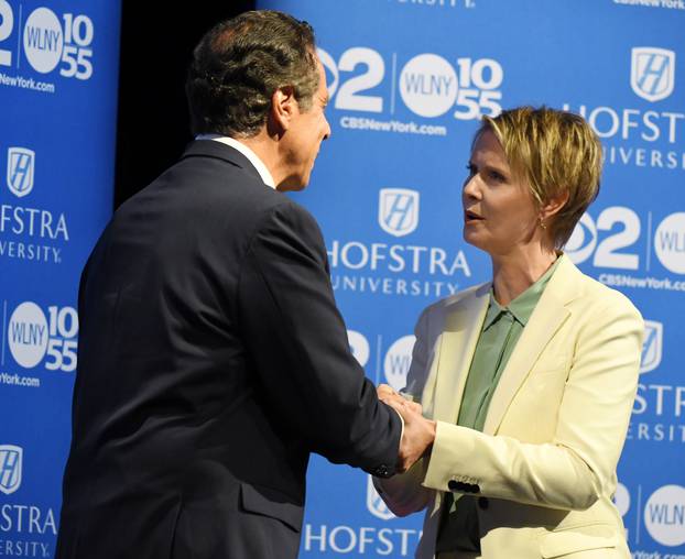 Governor Andrew M. Cuomo shakes hand with Cynthia Nixon prior to the Democratic gubernatorial primary debate at Hofstra University in Hempstead