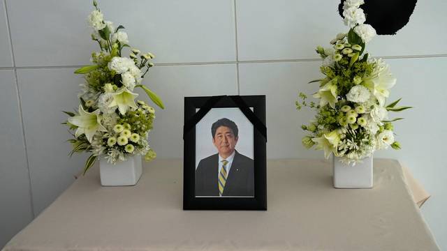 A portrait of late Japan’s Prime Minister  Shinzo Abe is seen at the residence of Japan’s ambassador to France, in Paris