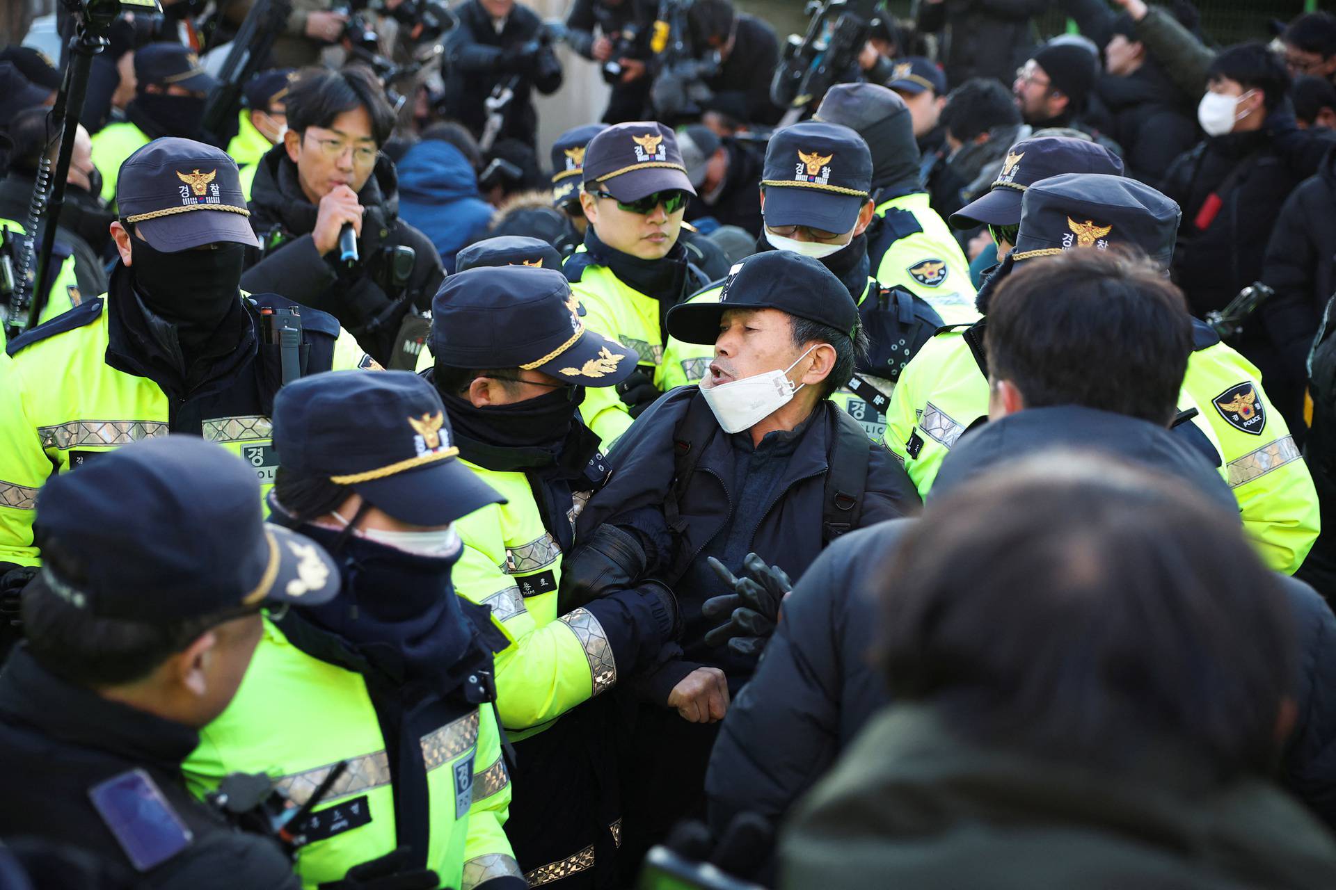 South Korean court issues arrest warrant for impeached President Yoon