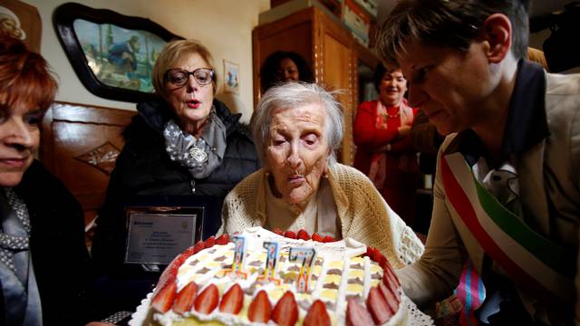 Emma Morano, thought to be the world's oldest person and the last to be born in the 1800s, blows candles during her 117th birthday in Verbania