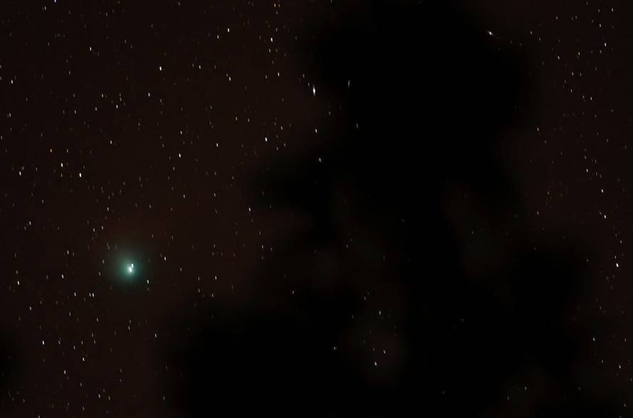 A green comet named Comet C/2022 E3 (ZTF), which last passed by our planet about 50,000 years ago is seen from the Pico de las Nieves
