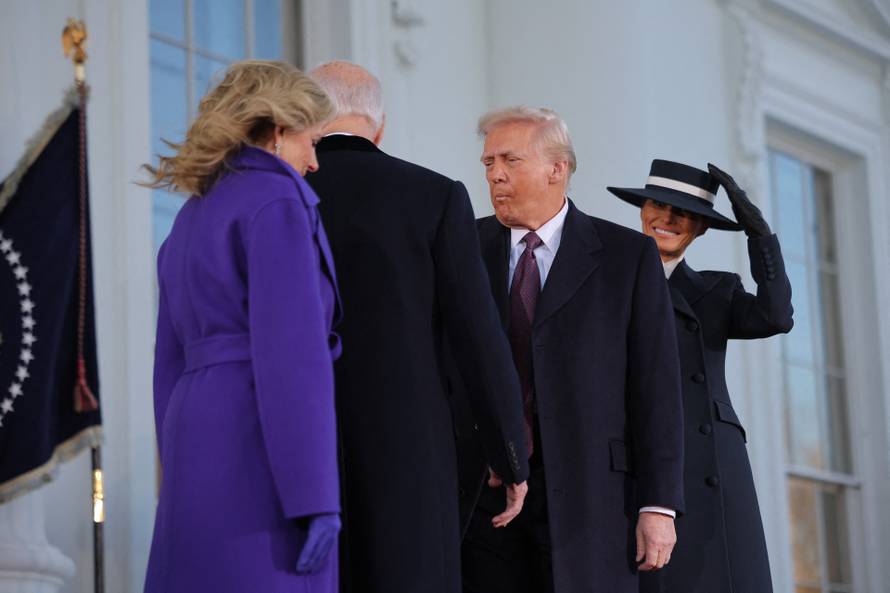 U.S. President-elect Donald Trump and his wife Melania Trump meet with U.S. President Joe Biden and first lady Jill Biden on inauguration day of Donald Trump's second presidential term in Washington