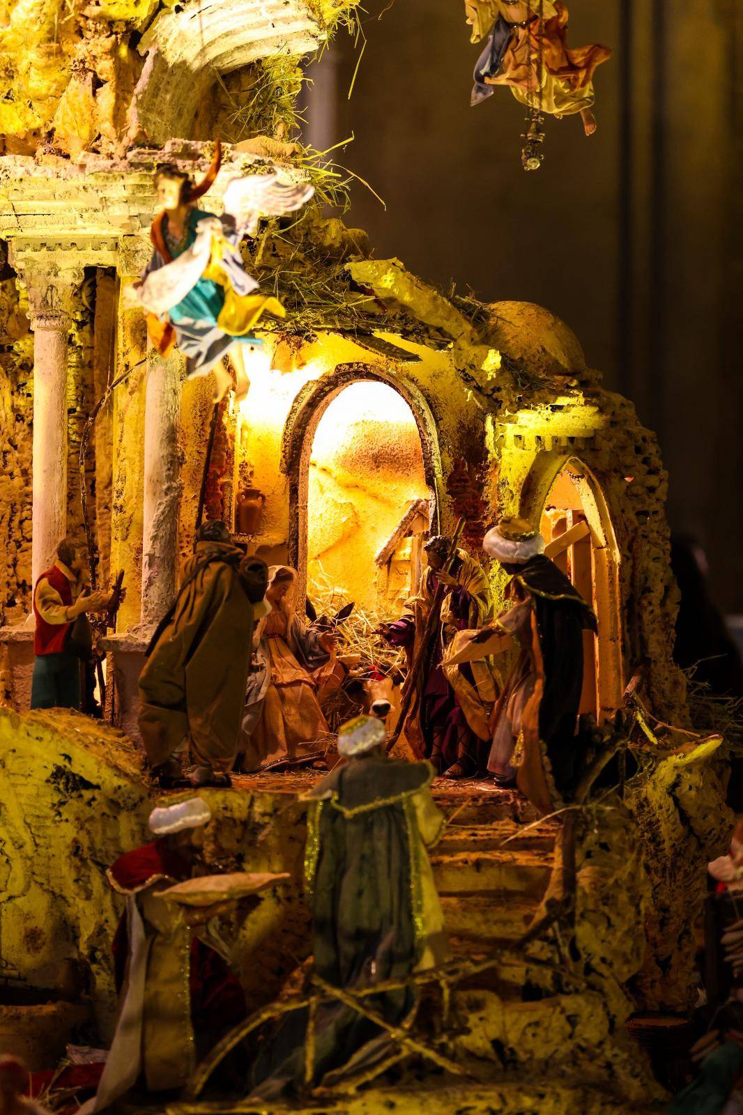 A large nativity scene whose base is also made of pizza to celebrate Christmas in the Basilica of Santa Chiara