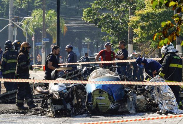 Small plane crashes into vehicles on busy Sao Paulo avenue