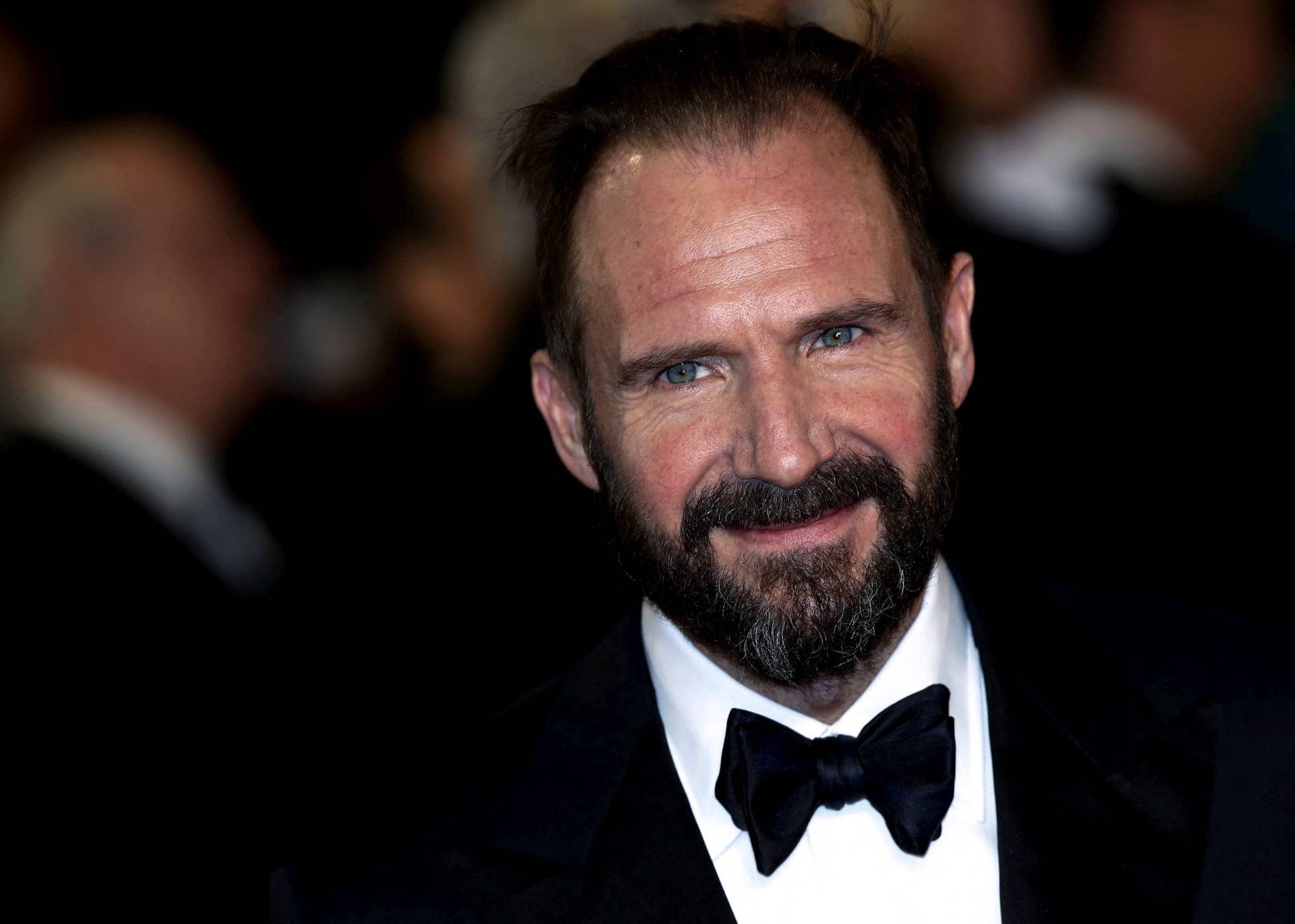 FILE PHOTO: Ralph Fiennes poses for photographers on the red carpet at the world premiere of the new James Bond 007 film "Spectre" at the Royal Albert Hall in London